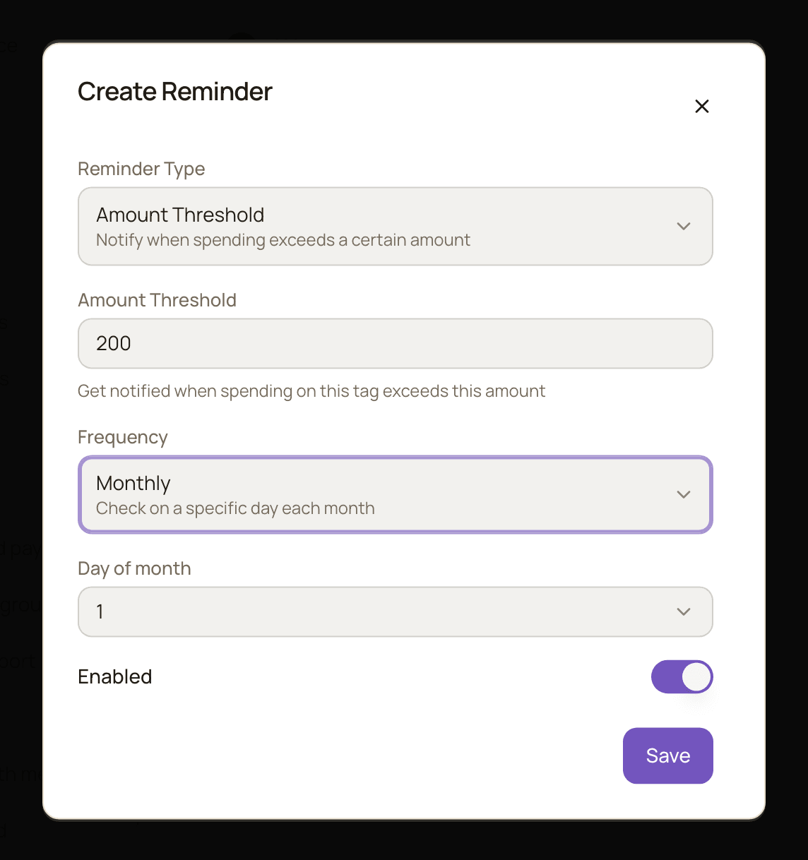 The Create Reminder form with Amount Threshold selected, a threshold of 200, Monthly frequency and day 1 of the month.